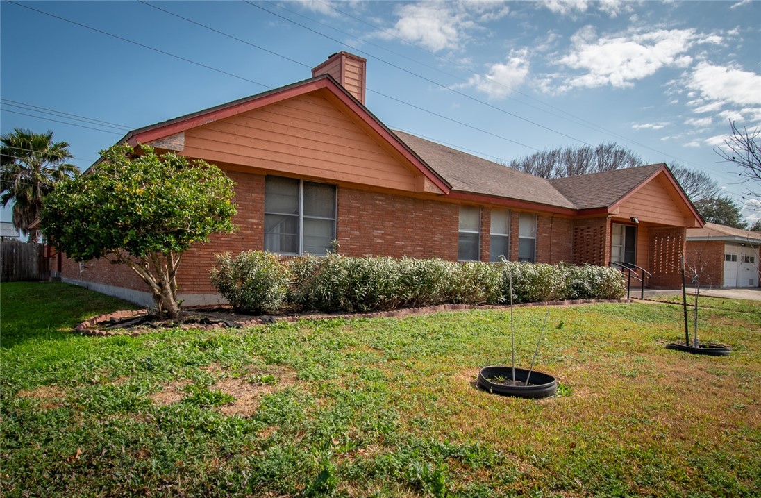 4502 Marie Street Corpus Christi, TX 78411 - Photo 2 of 26 a view of a house with a yard