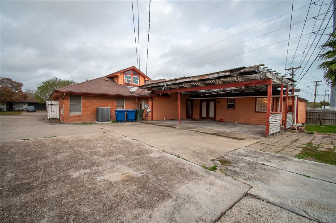 4502 Marie Street Corpus Christi, TX 78411 - Photo 25 of 26 a front view of a house with a garage