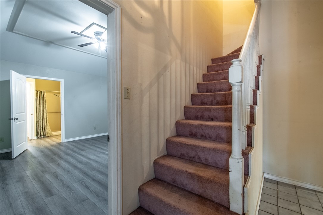 4502 Marie Street Corpus Christi, TX 78411 - Photo 9 of 26 a view of entryway with wooden floor and stairs