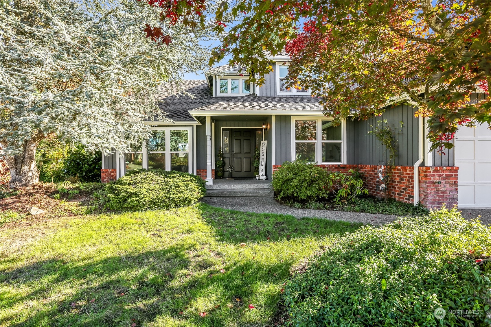 4625 Northeast 18th Street Renton, WA 98059 - Photo 1 of 35 front view of a house with a garden