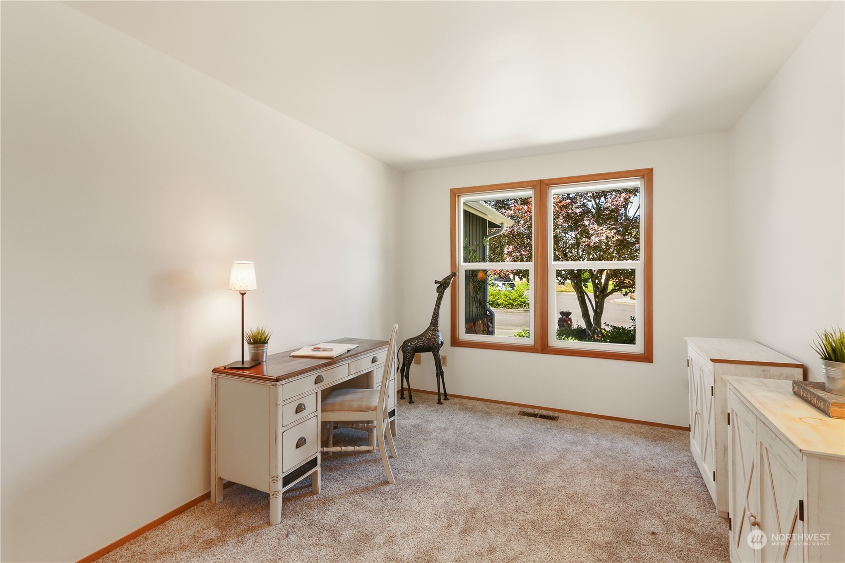 4625 Northeast 18th Street Renton, WA 98059 - Photo 20 of 35 a view of a workspace with furniture and a window