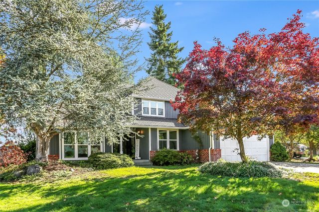 a view of a building with a yard