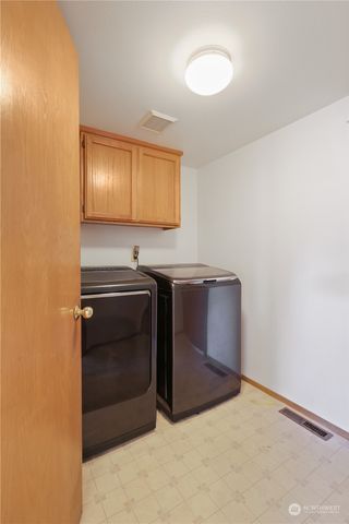 a kitchen with stainless steel appliances a stove and a refrigerator