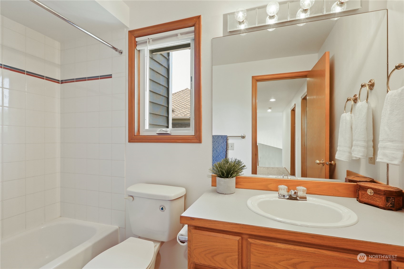 4625 Northeast 18th Street Renton, WA 98059 - Photo 30 of 35 a bathroom with a sink toilet and shower