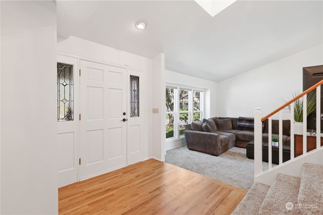 a bedroom with furniture and windows