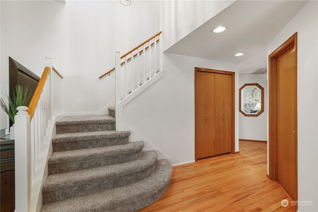 a view of entryway with wooden floor