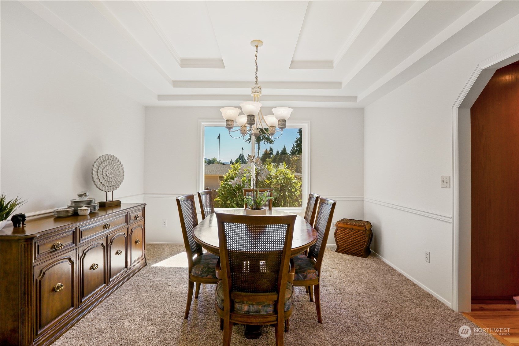 4625 Northeast 18th Street Renton, WA 98059 - Photo 10 of 35 a view of a dining room with furniture and chandelier