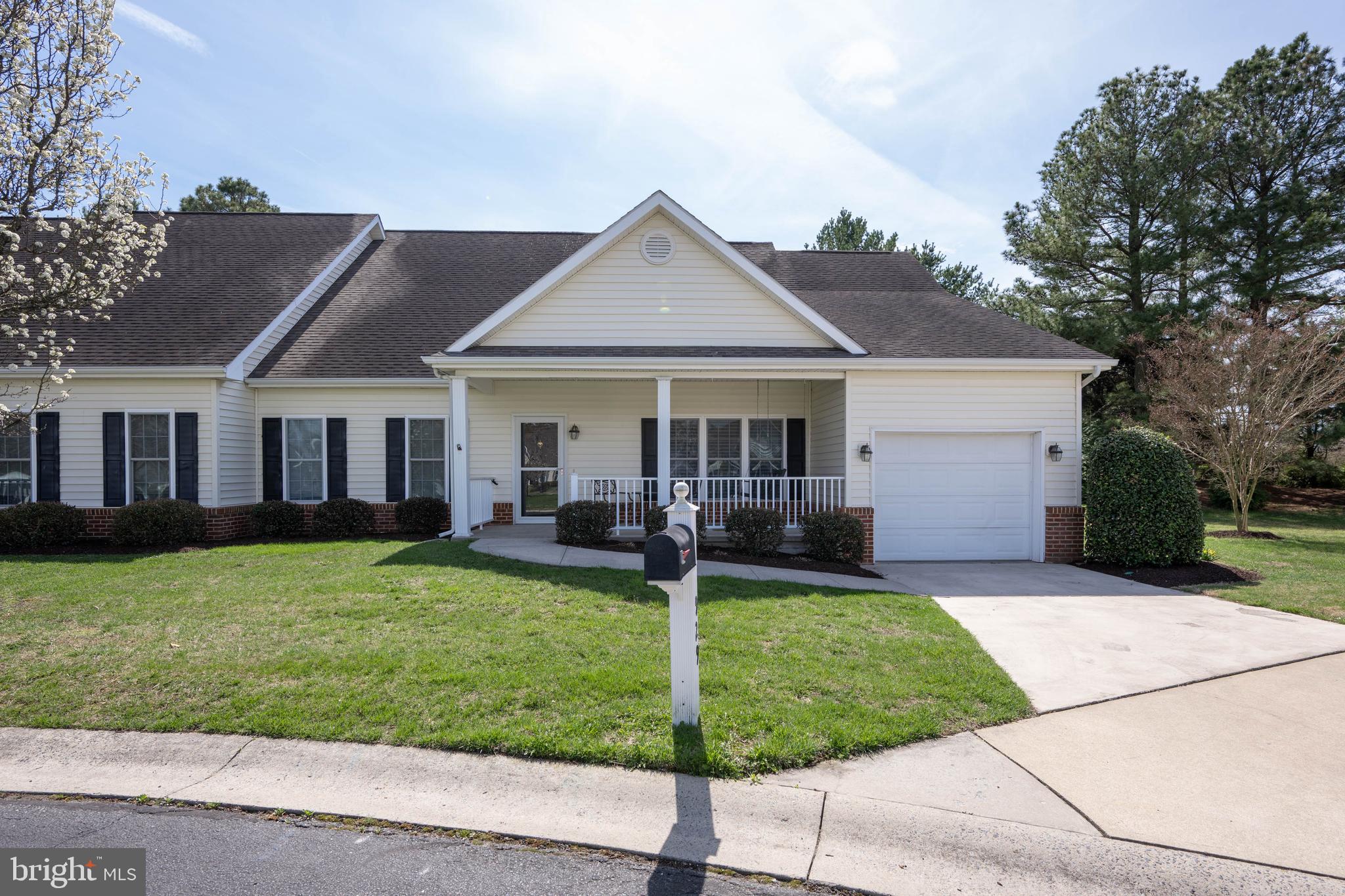929 Winding Way Salisbury, MD 21804 - Photo 2 of 31 a view of a house with a yard and porch