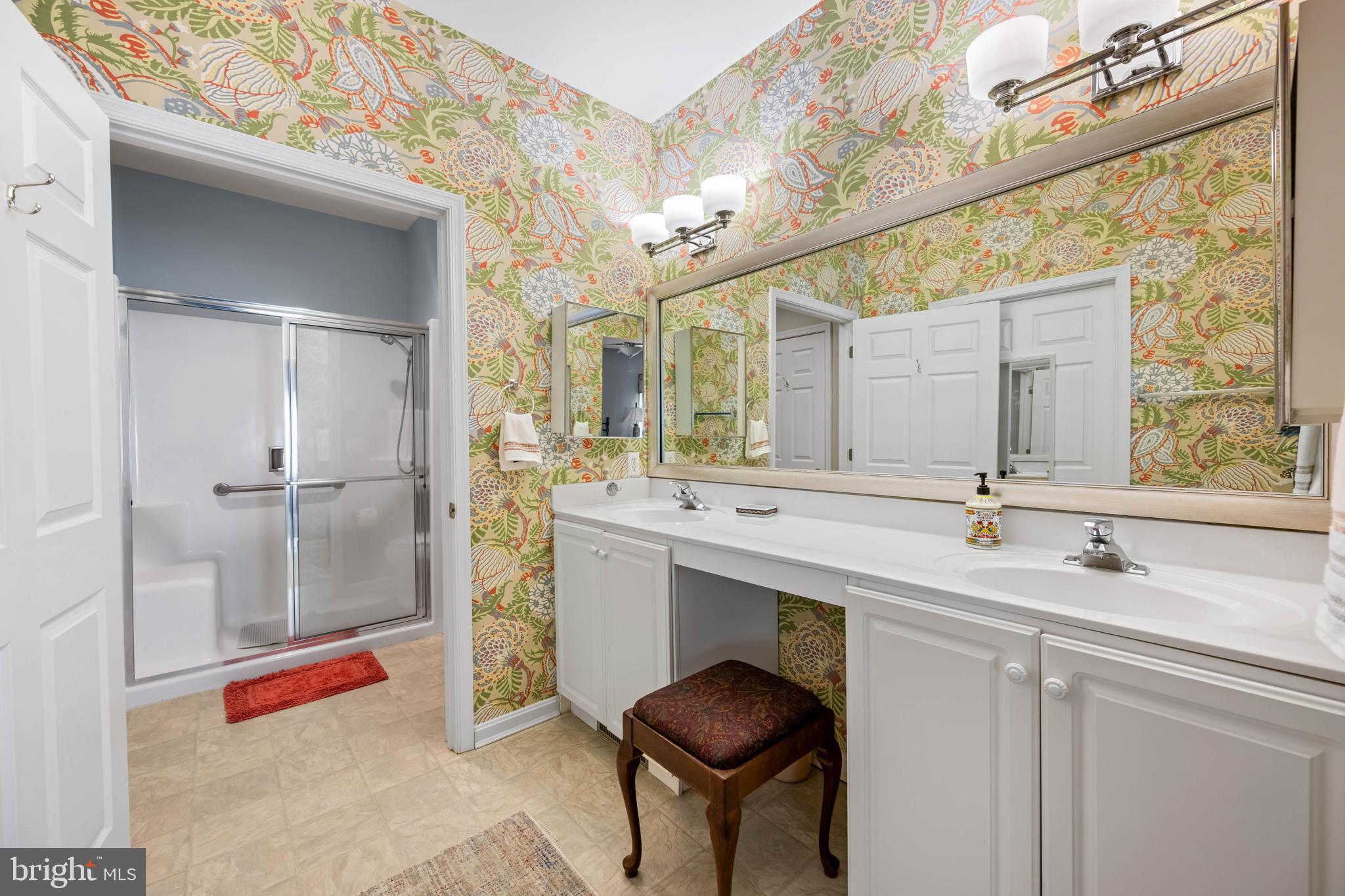 929 Winding Way Salisbury, MD 21804 - Photo 22 of 31 a bathroom with a sink and a mirror