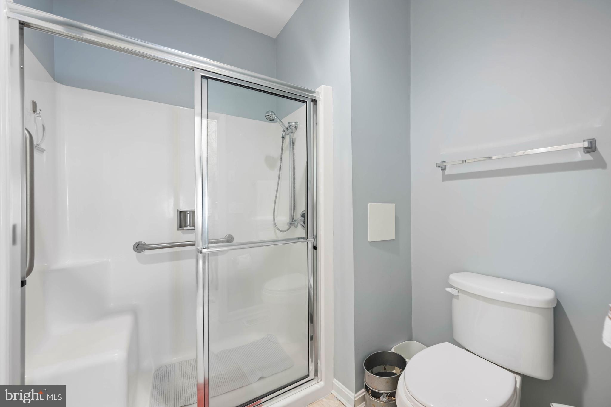 929 Winding Way Salisbury, MD 21804 - Photo 23 of 31 a white toilet next to a bathroom