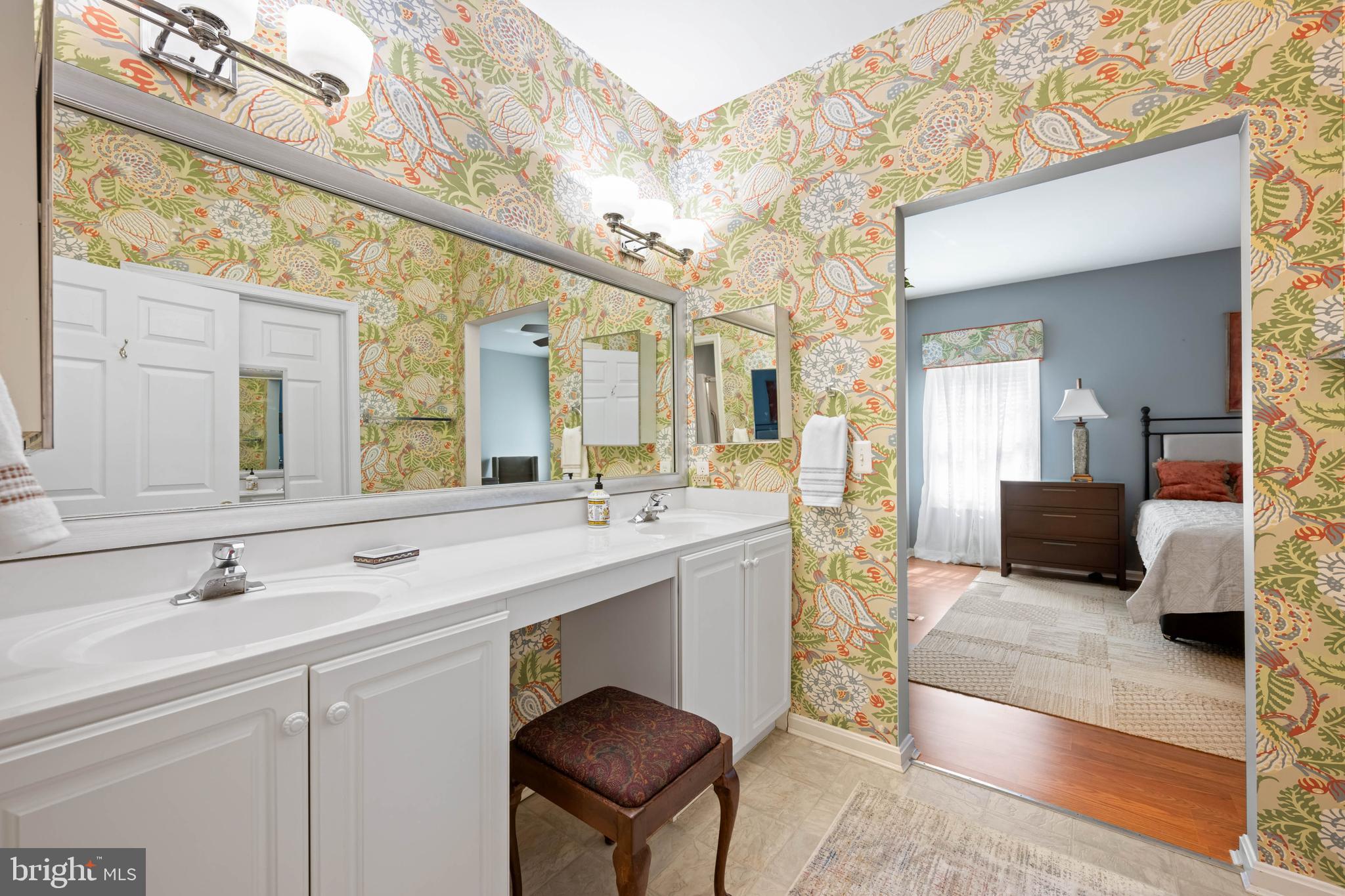 929 Winding Way Salisbury, MD 21804 - Photo 24 of 31 a spacious bathroom with a sink double vanity and a mirror