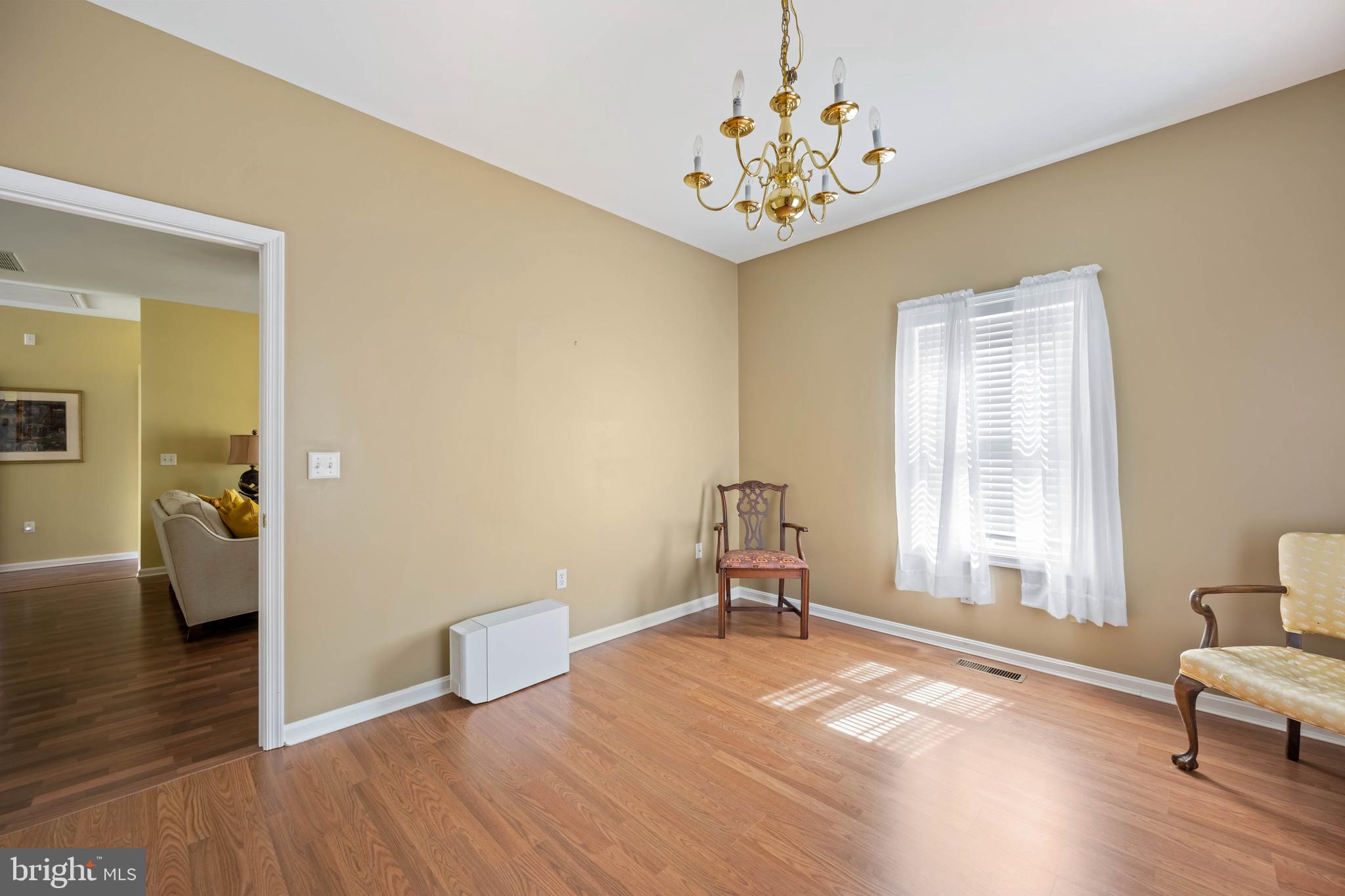929 Winding Way Salisbury, MD 21804 - Photo 27 of 31 a view of a livingroom with wooden floor and furniture