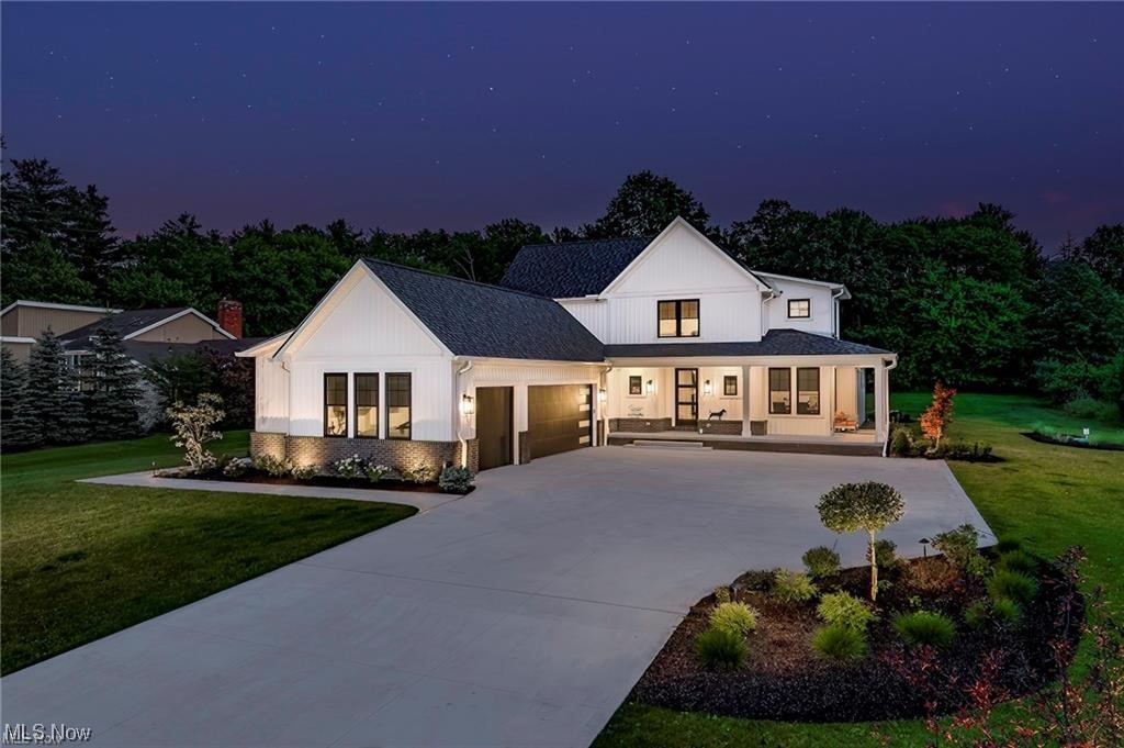 31400 Jackson Road Chagrin Falls, OH 44022 - Photo 1 of 29 Welcome to this stunning 2022 Modern farmhouse located in the desirable Moreland Hills, situated on a private 1.60 acre lot. This smart home features heated 3 car garage with EV power station.