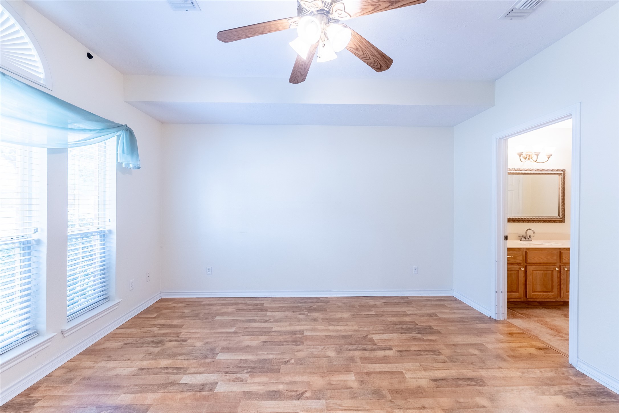 4802 Treadgold Lane Bryan, TX 77802 - Photo 13 of 27 a view of an empty room and window
