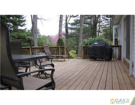 35 Clive Hills Road Edison, NJ 08820 - Photo 15 of 20 a black and white photo of a hardwood floor