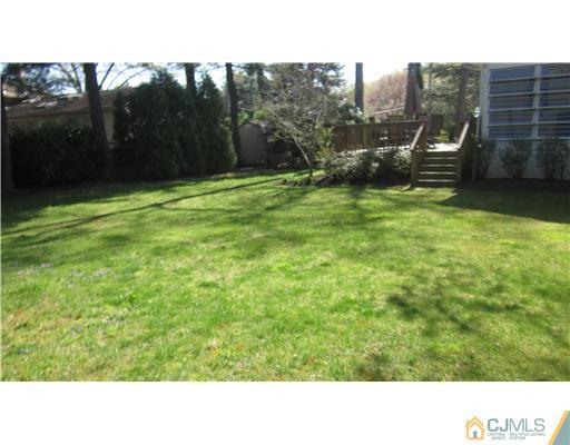35 Clive Hills Road Edison, NJ 08820 - Photo 19 of 20 a open view of a city