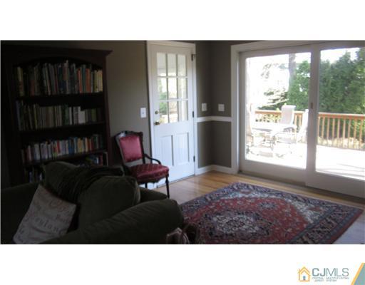 35 Clive Hills Road Edison, NJ 08820 - Photo 4 of 20 a living room with furniture and a window