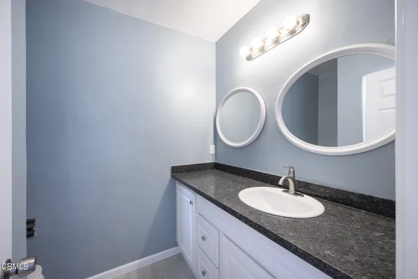 a bathroom with a shower and a toilet