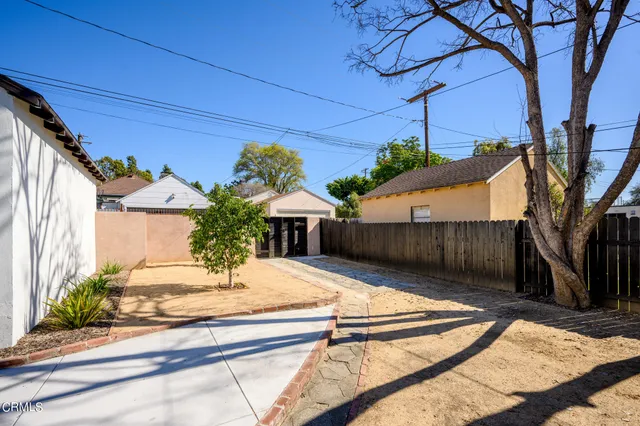 a view of backyard of a house