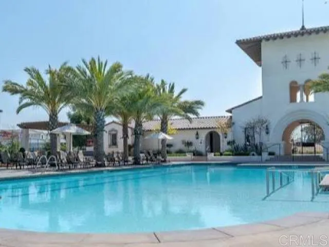 a front view of a house with swimming pool