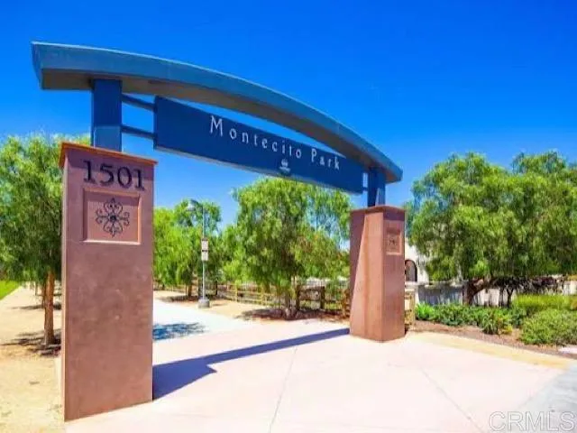 a view of a building with a tree
