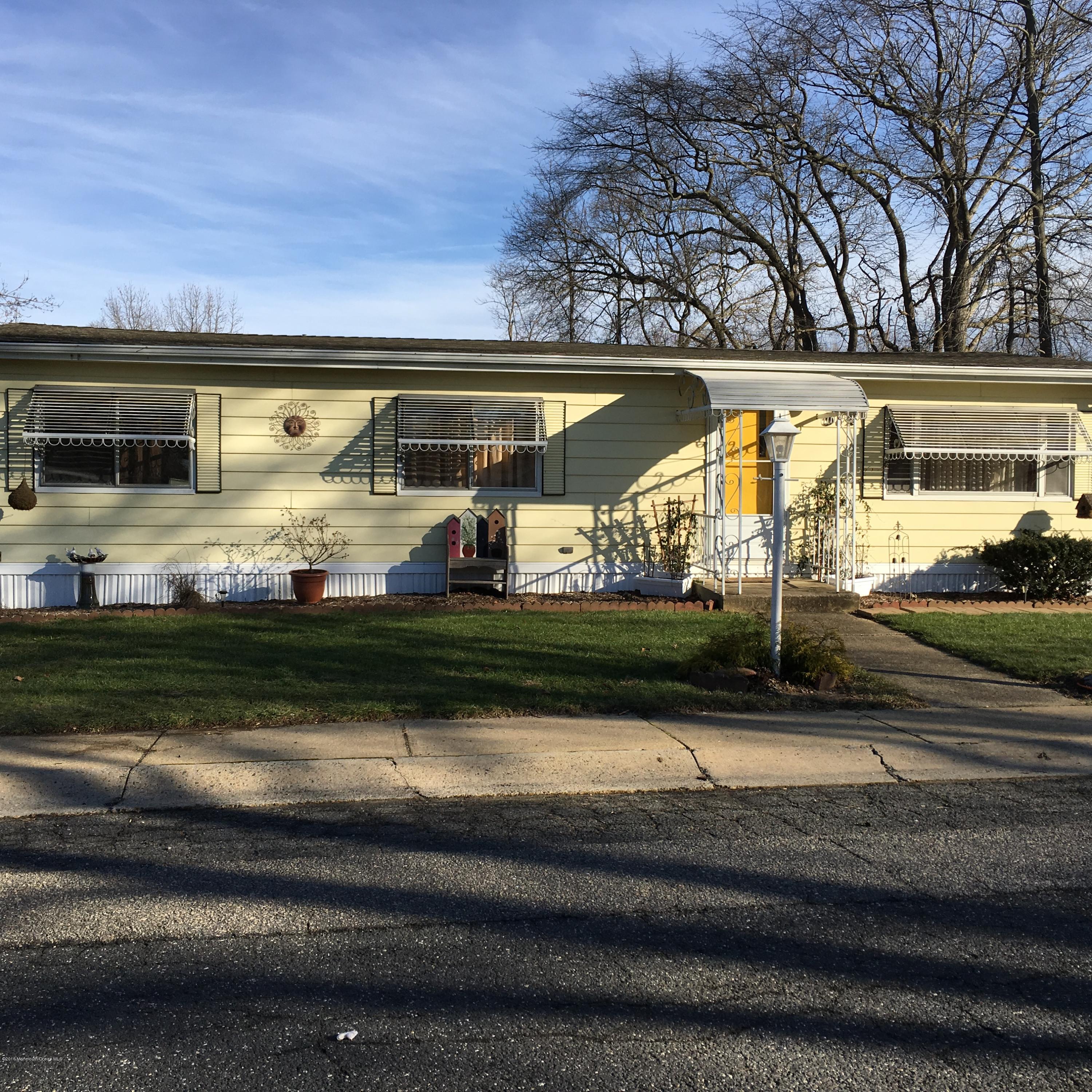 571 Cherin Road Freehold, NJ 07728 - Photo 1 of 17 a view of a car park front of a house