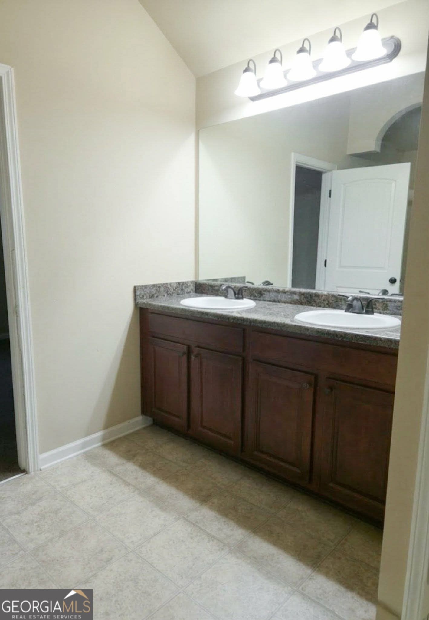 2912 Wellington Street Augusta, GA 30909 - Photo 15 of 23 a bathroom with a sink and a mirror