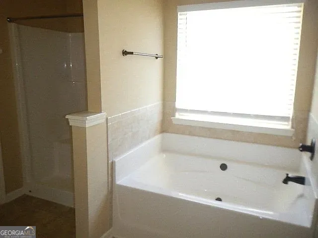 a view of kitchen with furniture and window