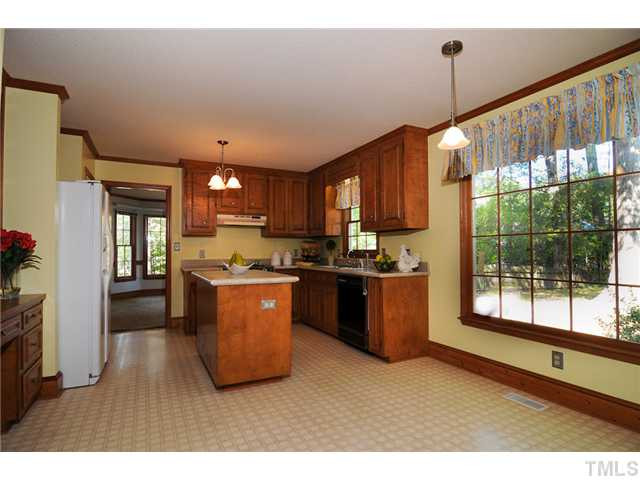 4018 Swarthmore Road Durham, NC 27707 - Photo 5 of 21 There are built-in shelves and a desk in the kitchen plus plenty of cabinet and counter space, large center island, extra storage and a nice sized pantry. The breakfast area offers lovely views out into the backyard. Breakfast Area