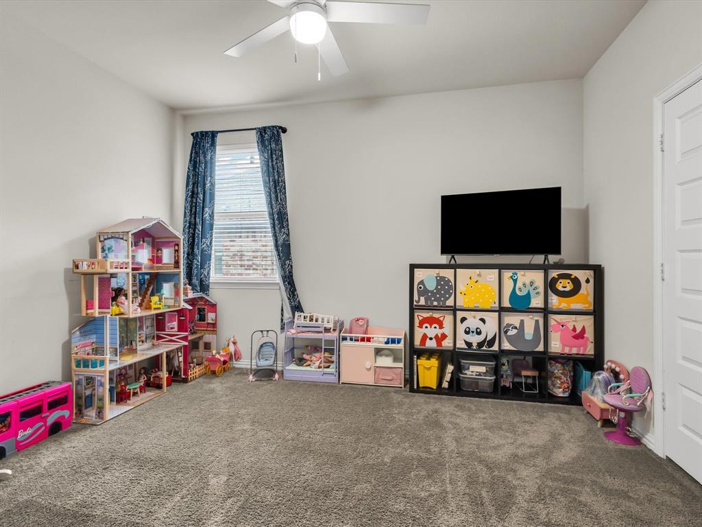 916 Monarch Lane Celina, TX 75009 - Photo 21 of 26 a view of game room with toys