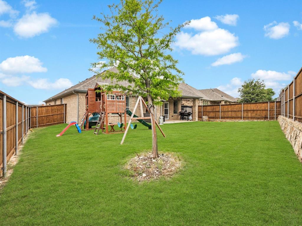 916 Monarch Lane Celina, TX 75009 - Photo 25 of 26 a garden view