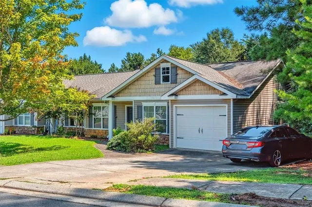 a view of house with garden