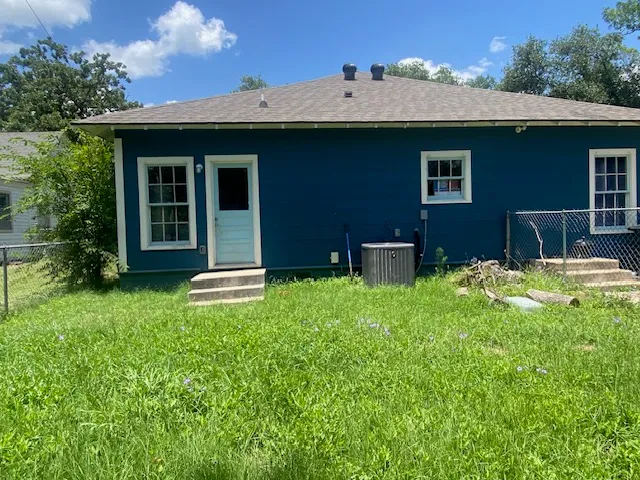 a house view with a garden space