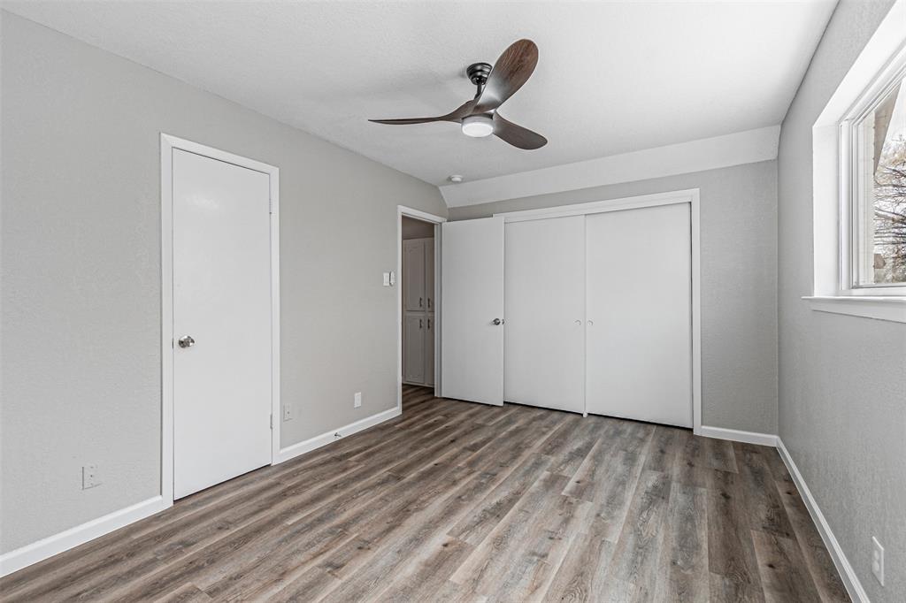 1160 Harrison Lane Hurst, TX 76053 - Photo 24 of 34 a view of empty room with wooden floor