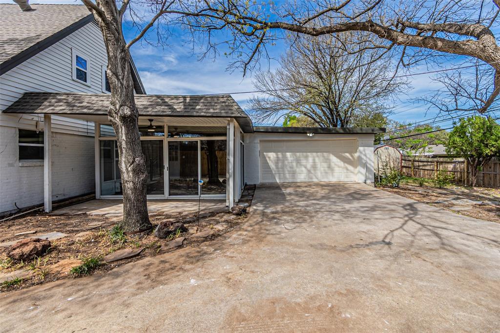 1160 Harrison Lane Hurst, TX 76053 - Photo 31 of 34 a view of a house with a yard