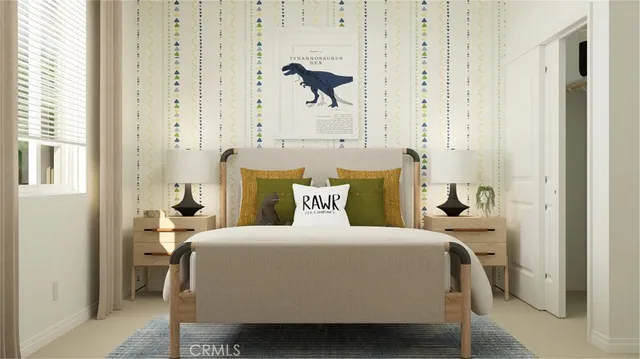 a bedroom with a bed and a window