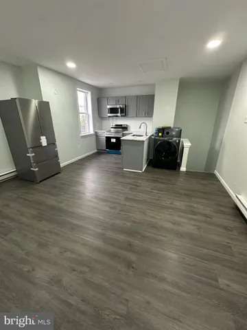 a view of kitchen and sink