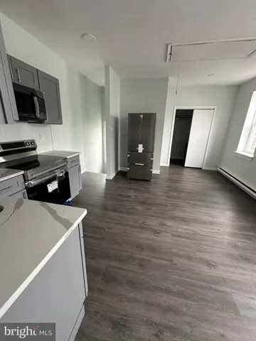 a view of kitchen and microwave