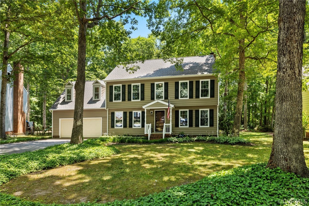 front view of a house with a yard