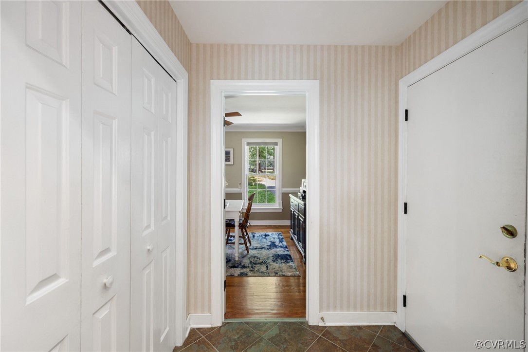 13817 Shadow Ridge Road Midlothian, VA 23112 - Photo 14 of 34 a view of a hallway with wooden floor and a livingroom