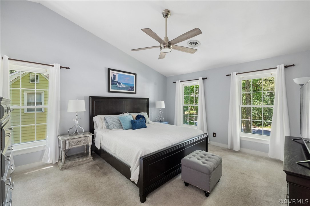 13817 Shadow Ridge Road Midlothian, VA 23112 - Photo 21 of 34 a large bedroom with a bed couch and window