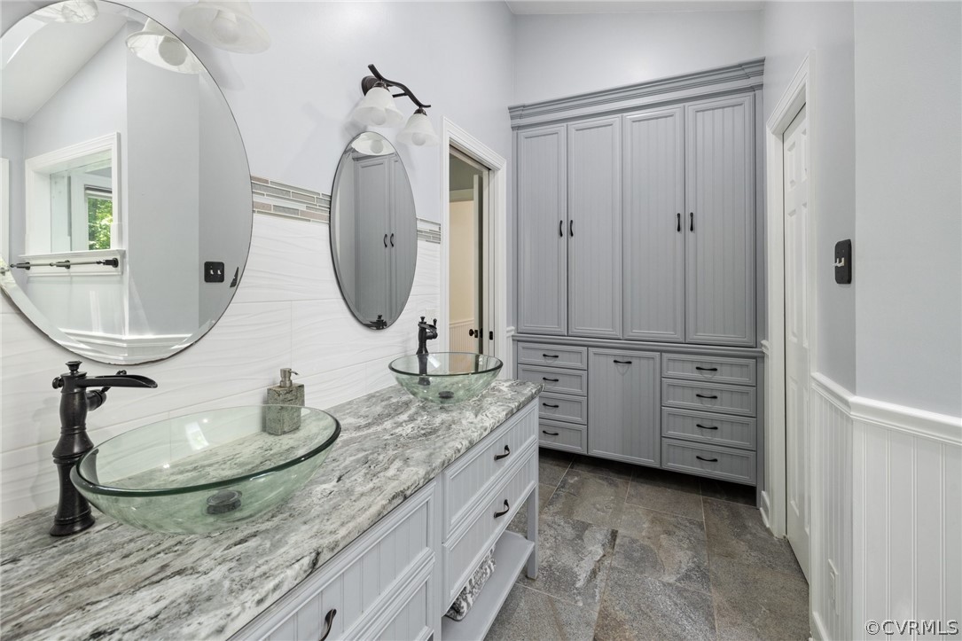 13817 Shadow Ridge Road Midlothian, VA 23112 - Photo 24 of 34 a bathroom with a granite countertop sink and a mirror