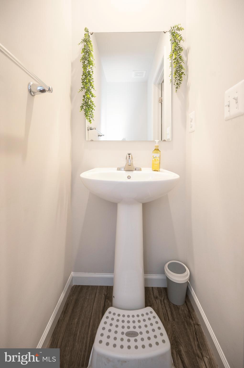 12062 Rundle Crossing King George, VA 22485 - Photo 18 of 67 a bathroom with a sink a toilet and a mirror