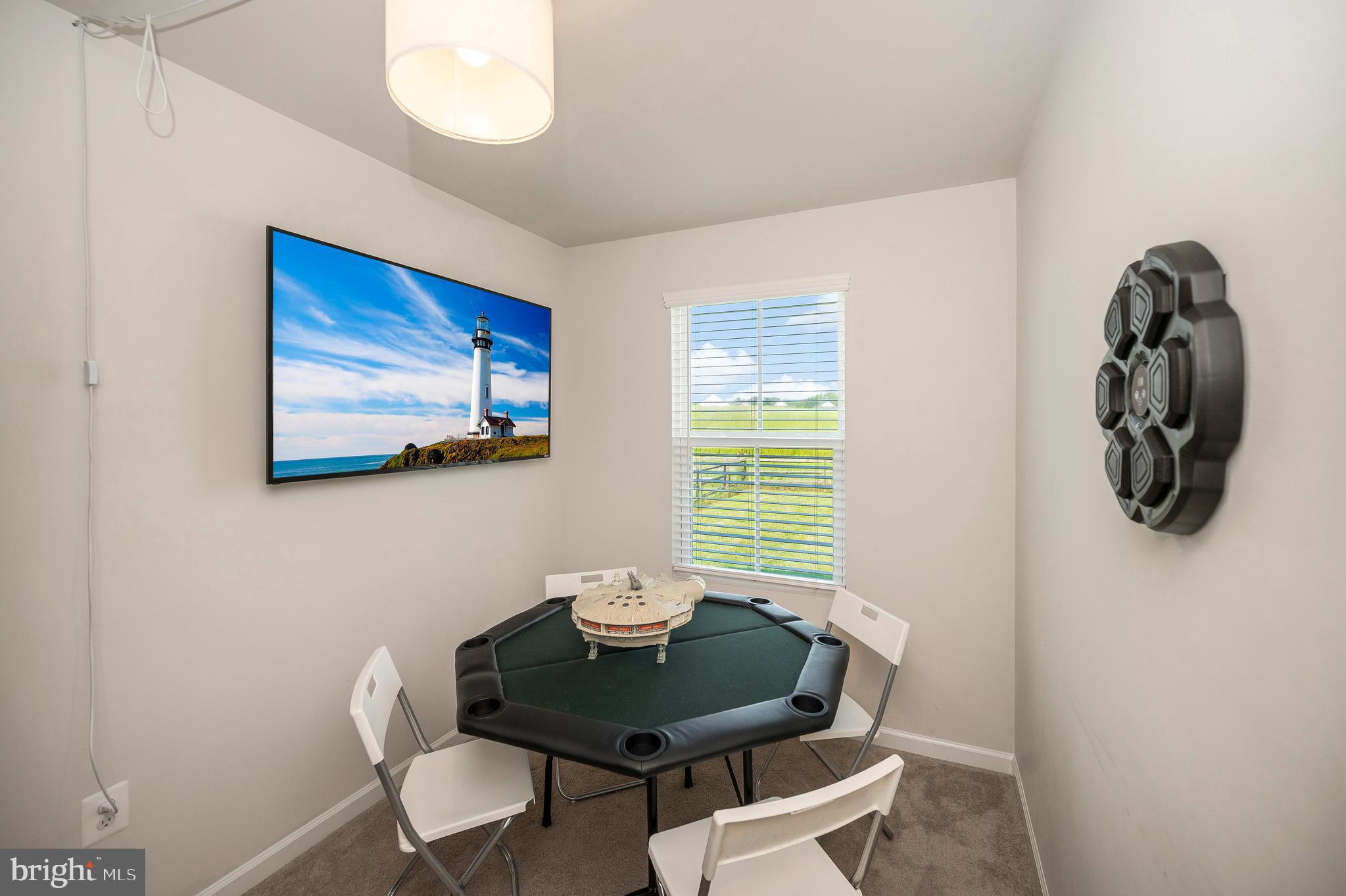 12062 Rundle Crossing King George, VA 22485 - Photo 19 of 67 a view of a dining room with furniture and a window