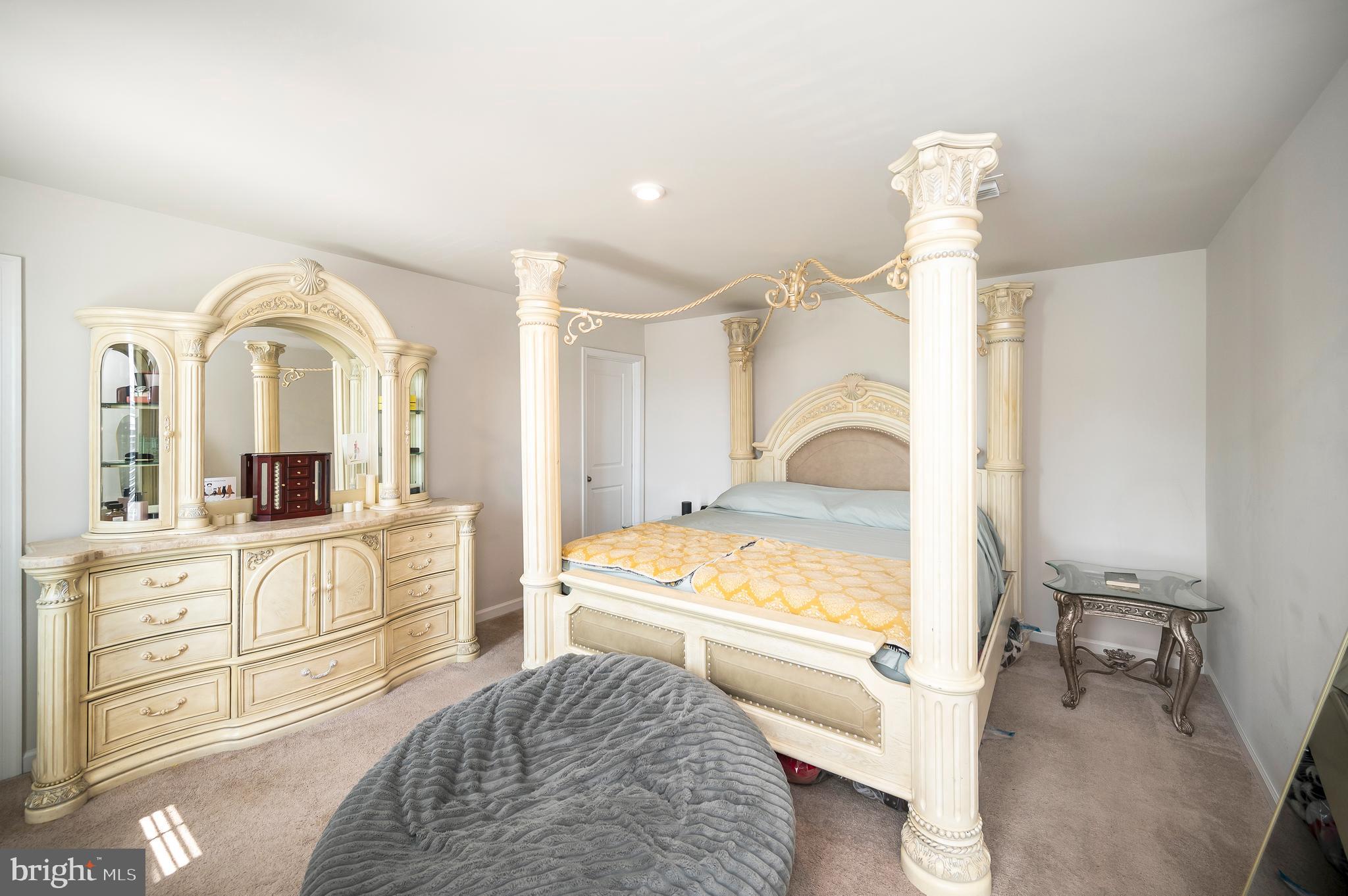 12062 Rundle Crossing King George, VA 22485 - Photo 20 of 67 a living room with furniture and a wooden floor