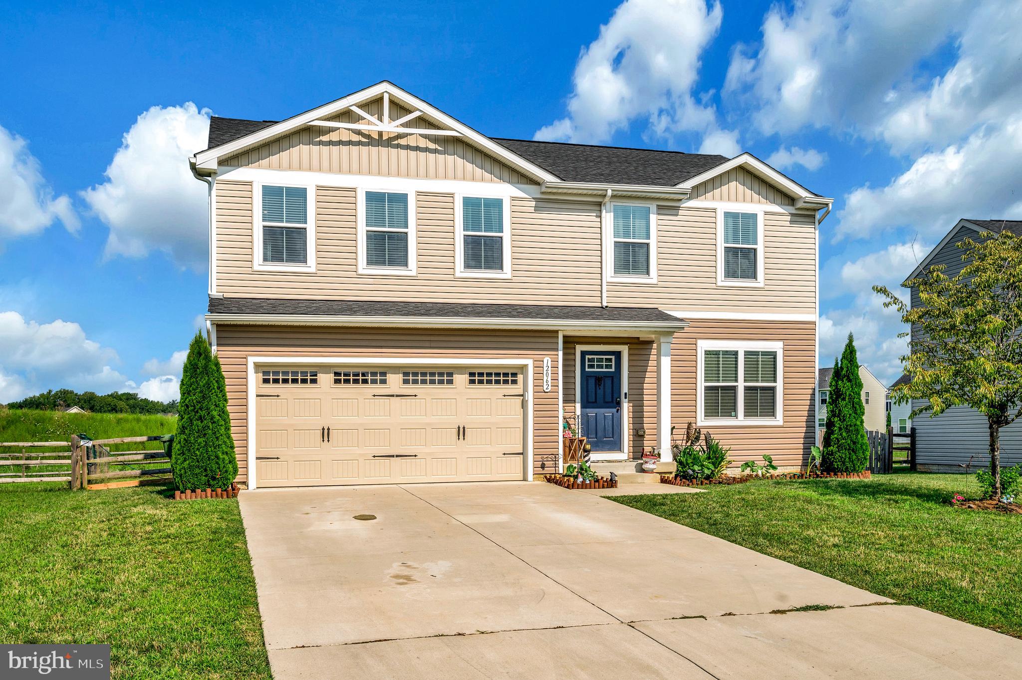 12062 Rundle Crossing King George, VA 22485 - Photo 2 of 67 front view of a house with a yard