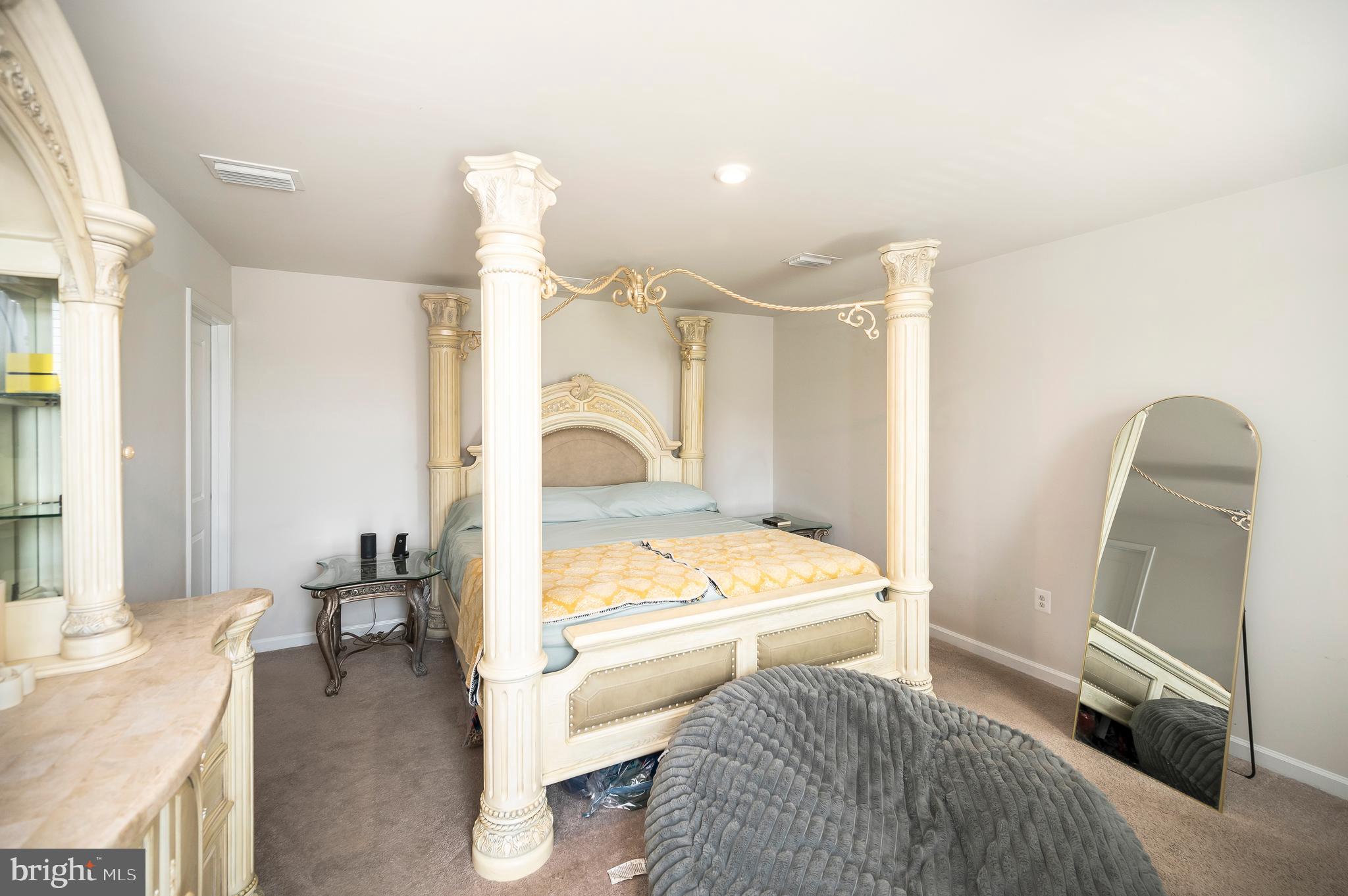 12062 Rundle Crossing King George, VA 22485 - Photo 21 of 67 a en suite bathroom with a sink a toilet and a tub