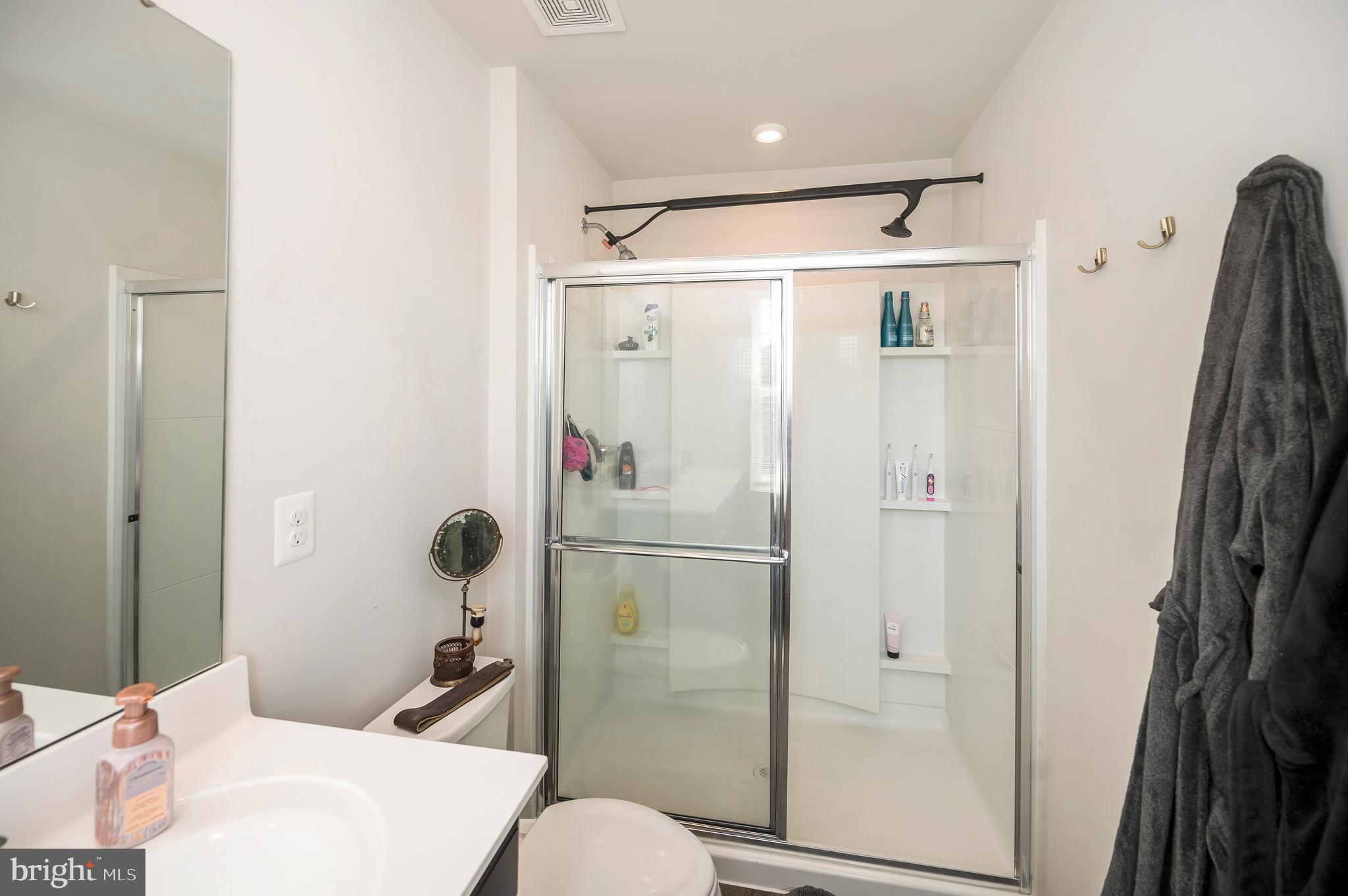 12062 Rundle Crossing King George, VA 22485 - Photo 23 of 67 a bathroom with a shower toilet and sink