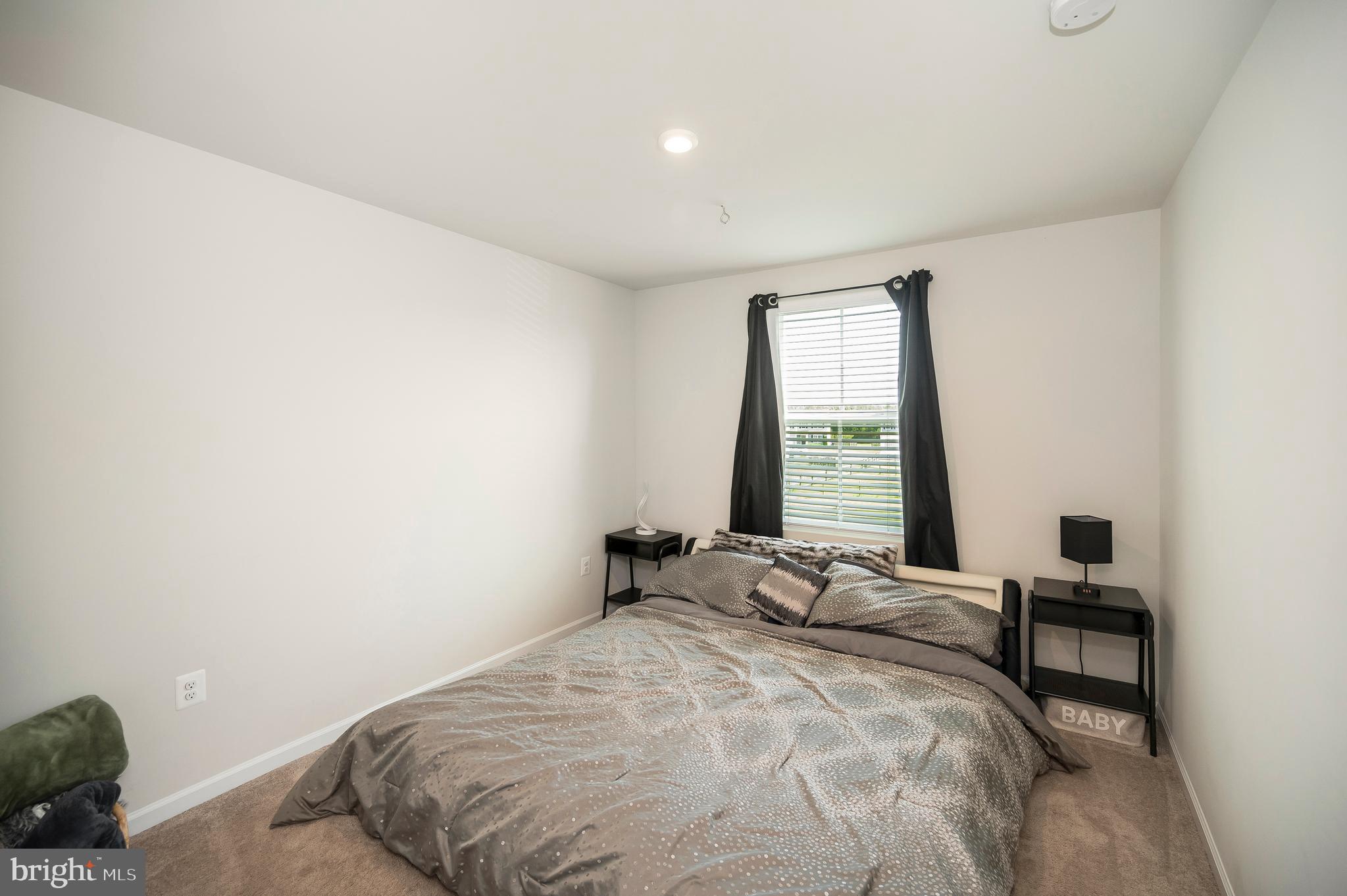 12062 Rundle Crossing King George, VA 22485 - Photo 26 of 67 a bedroom with a bed and a window