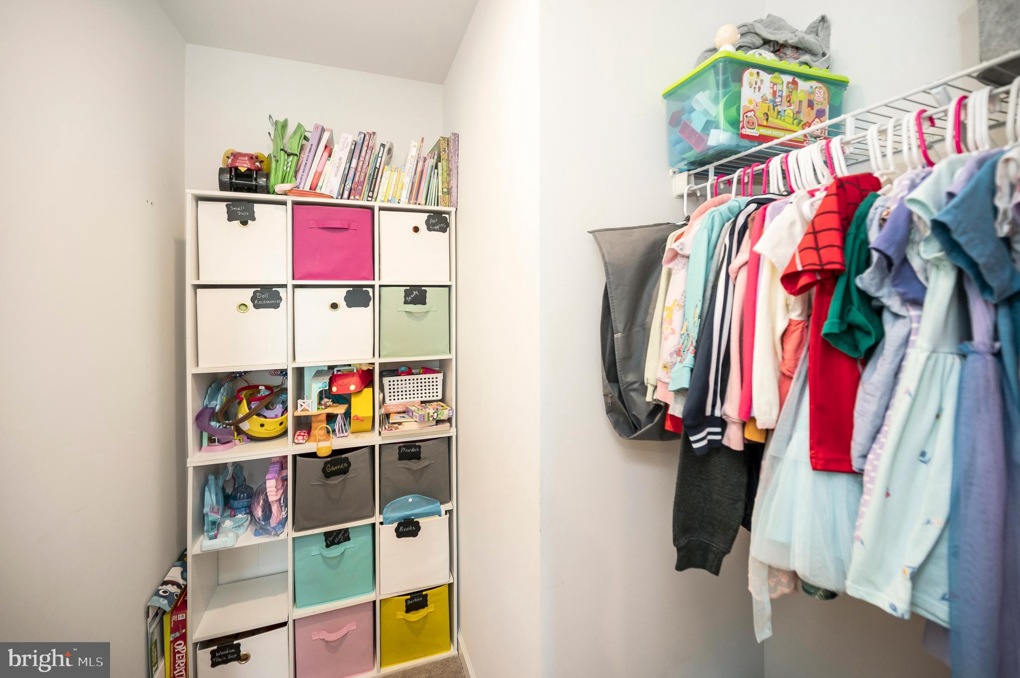 12062 Rundle Crossing King George, VA 22485 - Photo 35 of 67 a view of walk in closet with clothes and shoes